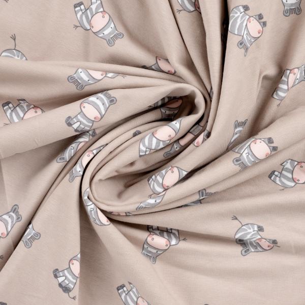 Baumwolljersey in Sand mit Zebra, Stoff in ganzer Breite